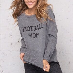 Wooden Ships by Paola Buendia Football Mom Sweater